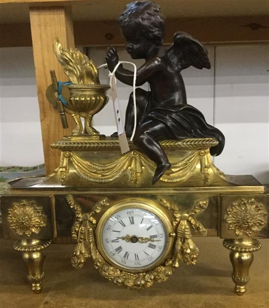 French clock with bronze cherub